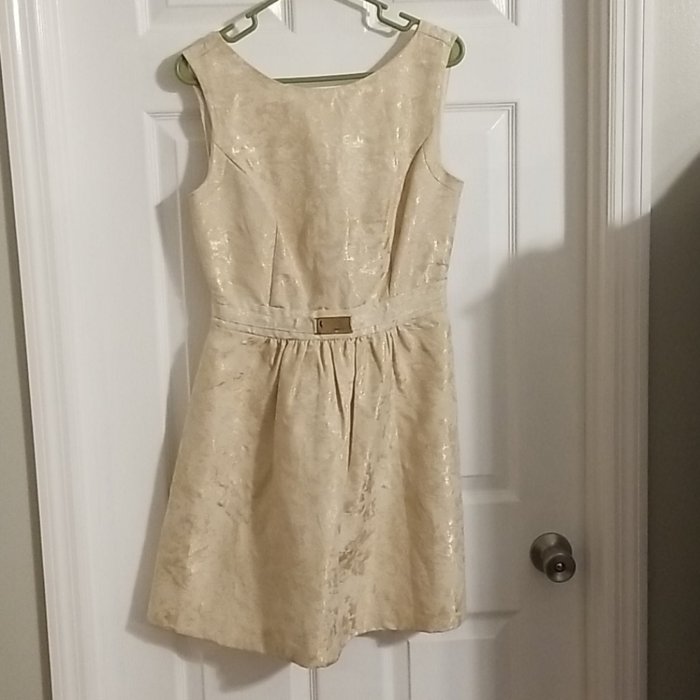 JLo gold dress.